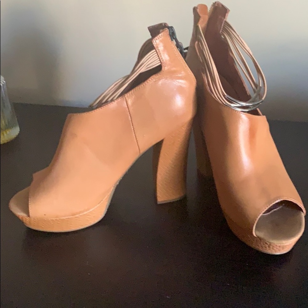 As new camel leather platform booties. Size 39.
